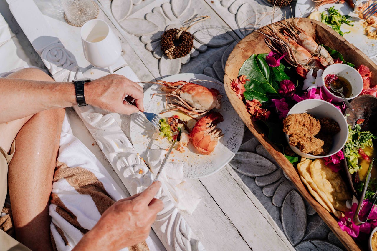 Enjoy authentic seafood with vibrant local flavors on a sunny day in Zanzibar.